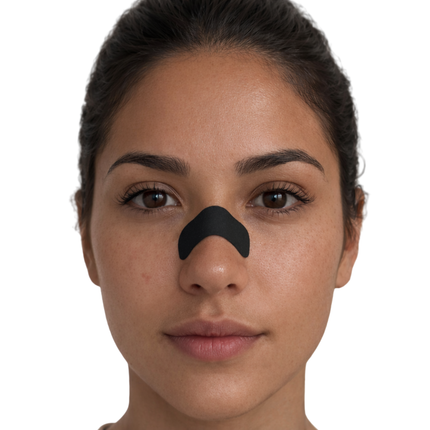 Woman wearing Breathe Like God extra strength nasal strip on nose